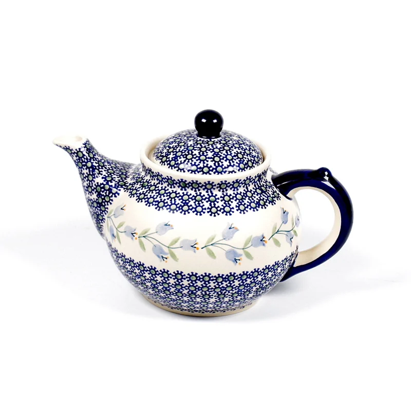 Grey 6-panel baseball hat with black brim, black mountain graphic on front, and light heather gray body.