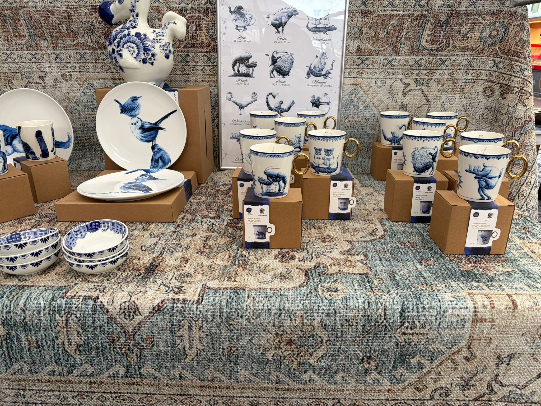 Natural leather mouse pad on white desk next to porcelain mug and keyboard.